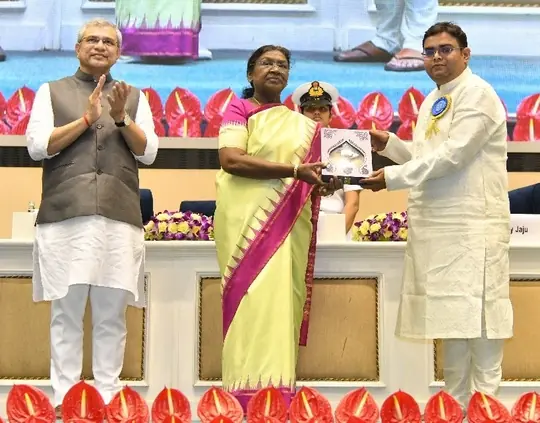 National Award-winning film editor Niladri Roy receiving the National Film Award from the President of India
